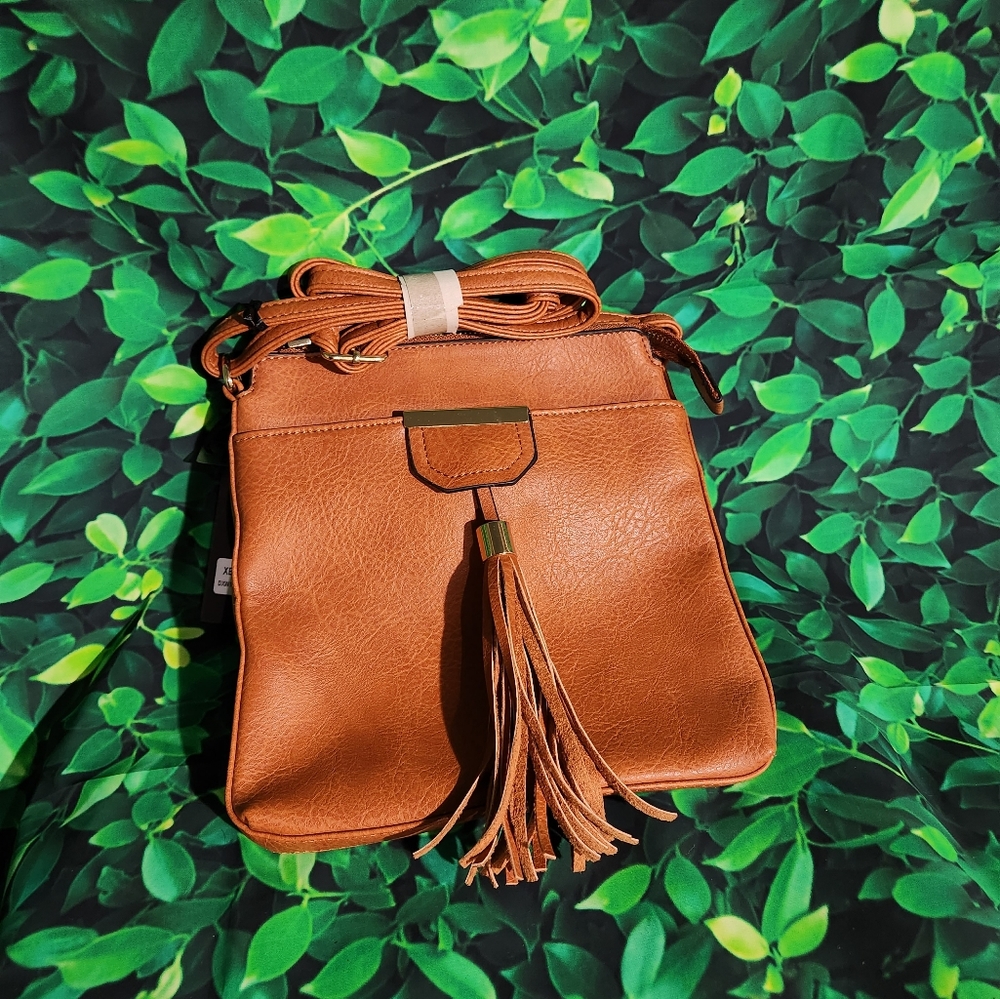 Cognac/Luggage color w/ gold harware, large size crossbody tassel bag.